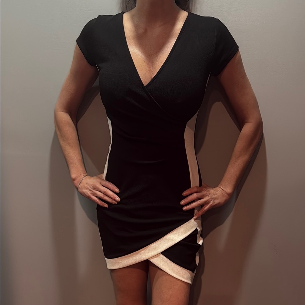 Almost Famous Black and White Asymmetrical Wrap Mini Dress